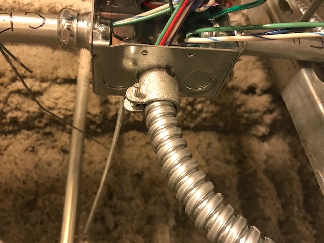 flexible conduit connected to a box